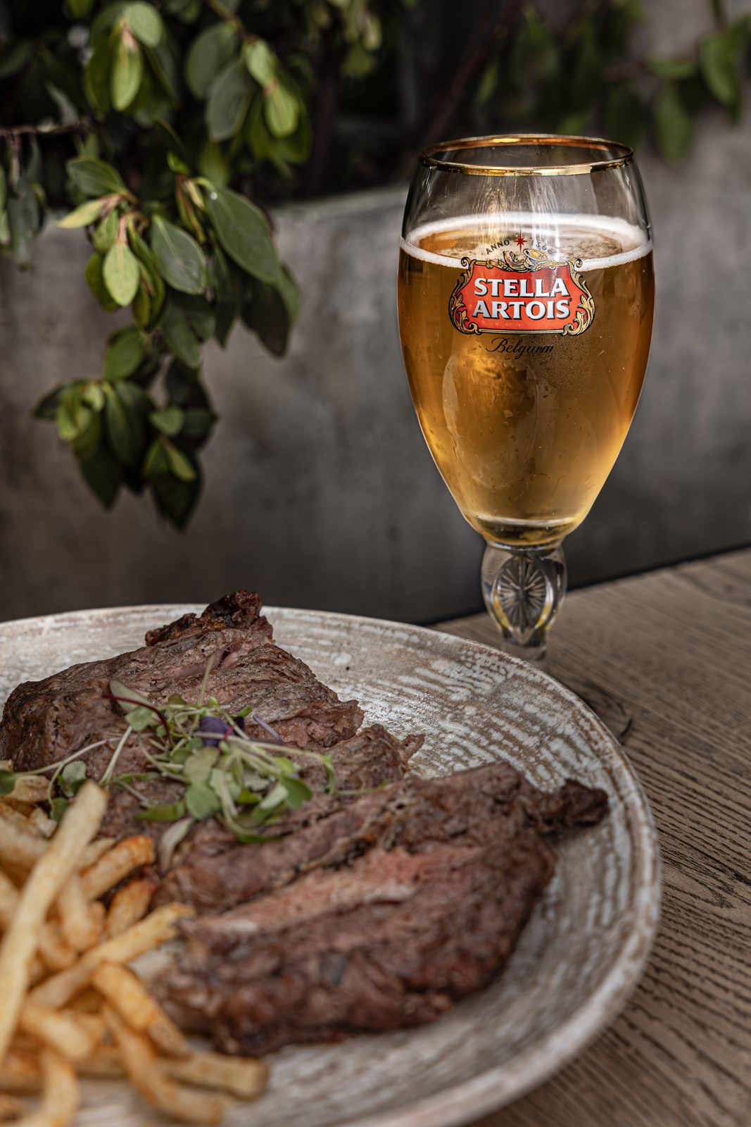 Stella Artois — the chalice beside steak frites